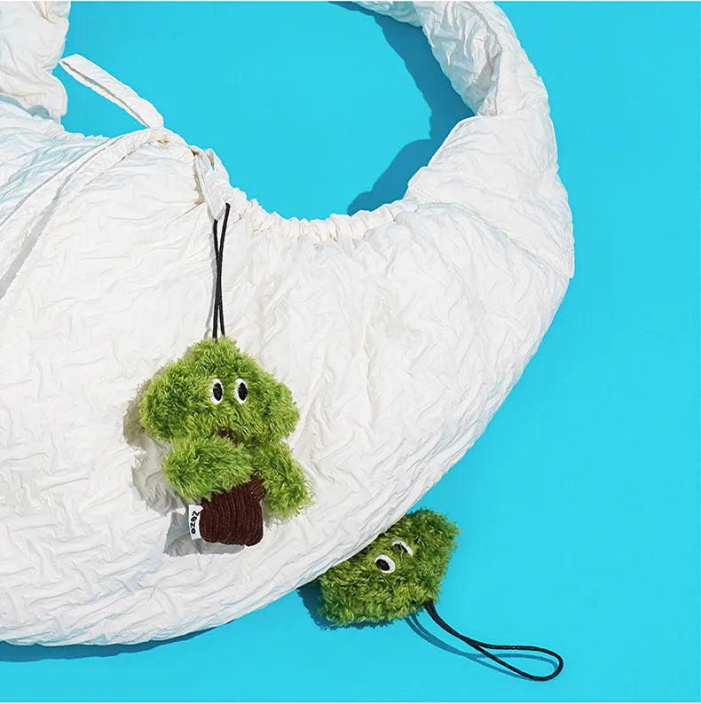 Pine tree-shaped cat toy pendant bag with mint filling for biting and grinding, shown in three size options.