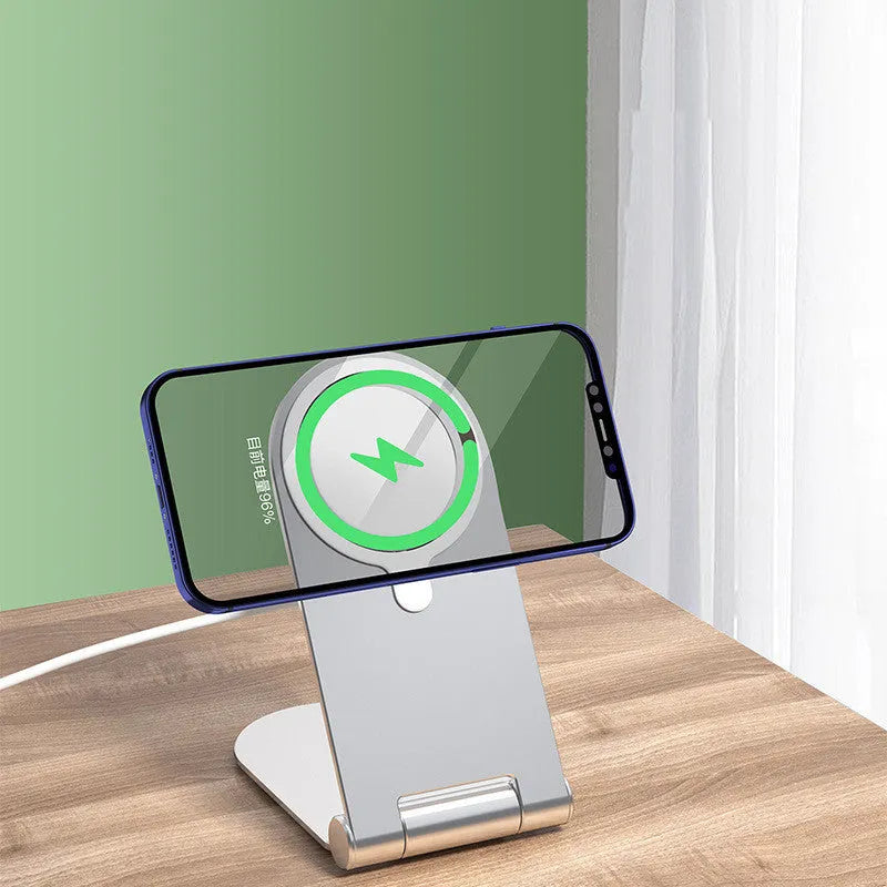 Silver vertical adjustable magnetic bracket for iPhone 12 mounted on dashboard