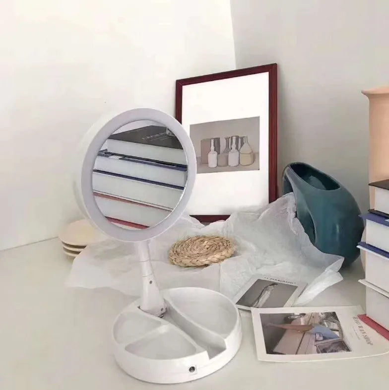 White acrylic LED vanity mirror with USB port and foldable storage compartments
