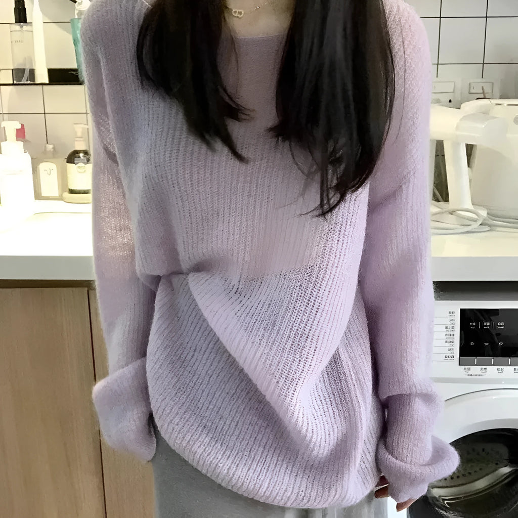 Purple sleeveless blouse with round neck and hollow out detailing on lightweight ice silk fabric