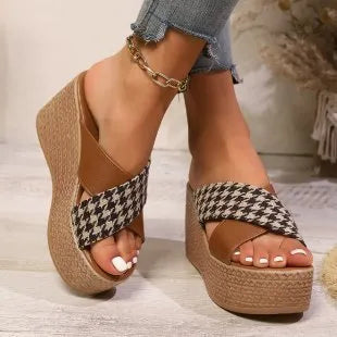 Brown plaid wedge sandals with cross leopard print and a black rubber sticky sole.