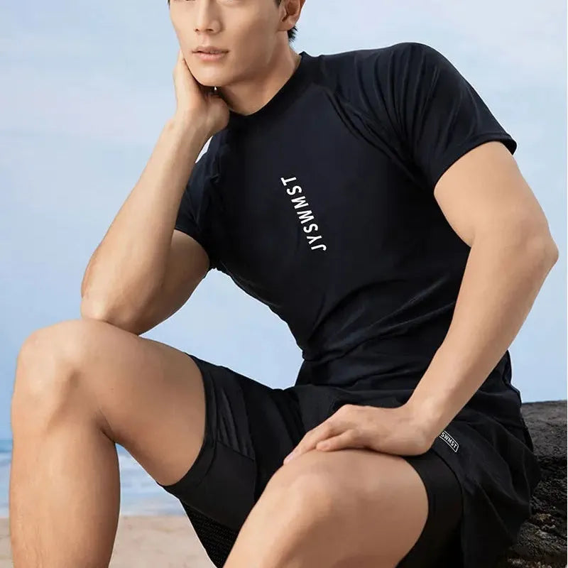 Men's plus size swimming trunks and matching rash guard top in polyester fabric.