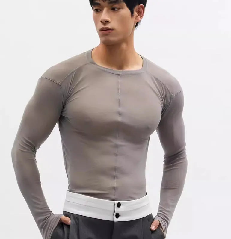 Women's black slim-fit mesh see-through long sleeve PU pullover on a hanger.