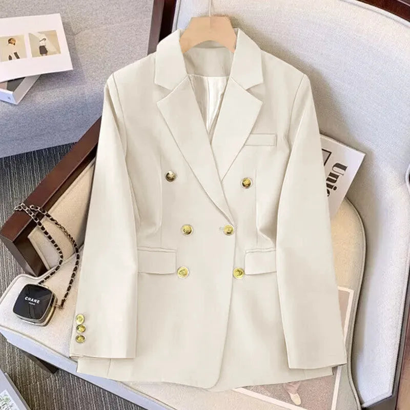 Women's loose fit polyester blouse in black, shown as part of a commute outfit.