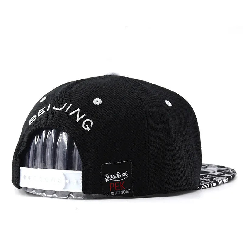 Adjustable cotton baseball cap with dome crown and letter embroidery in black or white