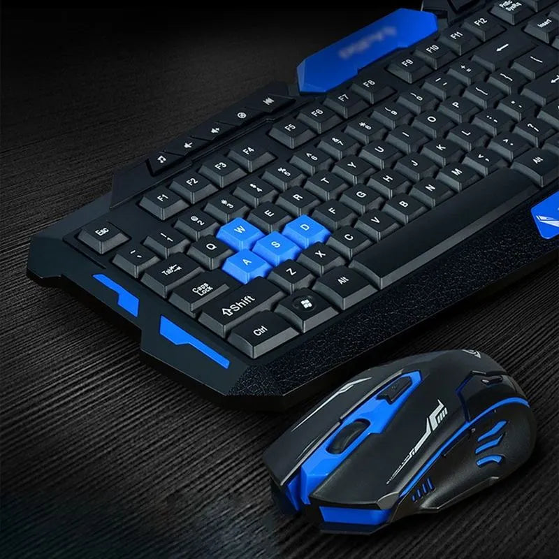 Black and blue wireless keyboard and mouse set showing 48cm keyboard with low-profile keys and gaming mouse with three buttons