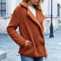 Women's loose lapel fluffy button-front winter coat in polyester fibre available in multiple colours