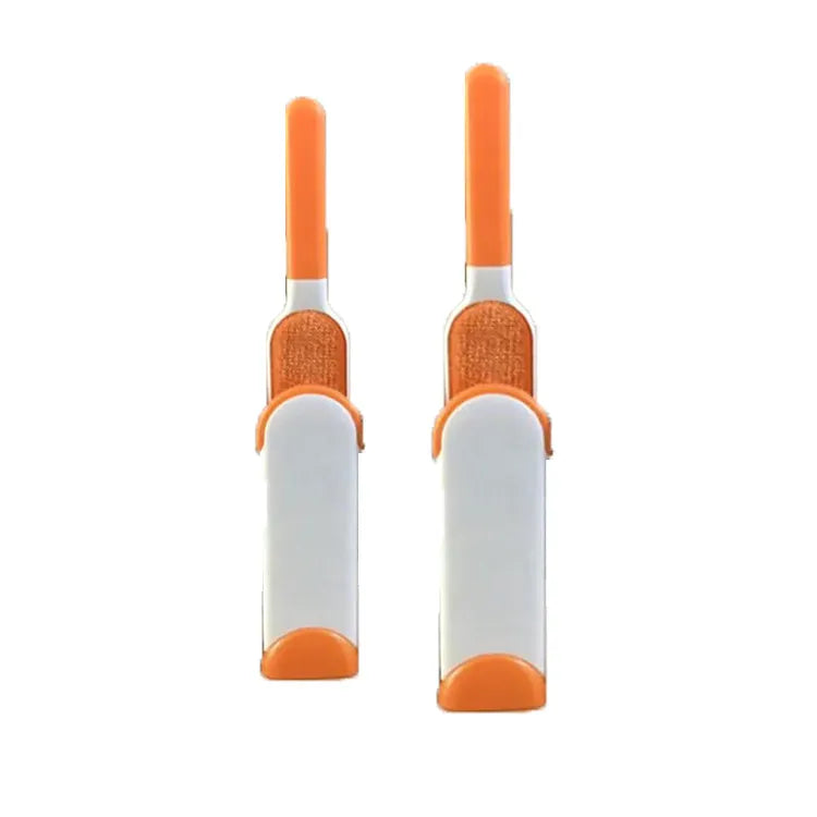 Blue reusable pet hair removal brush with double-sided sticky head placed on its self-cleaning base.