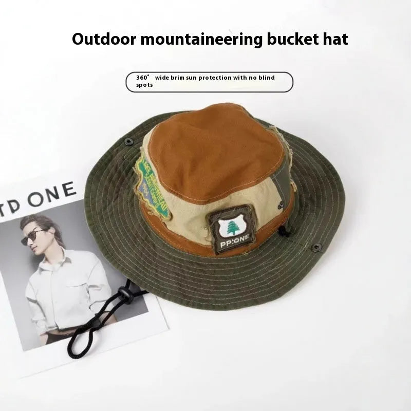 Army green foldable fisherman hat with patchwork design and flat top crown