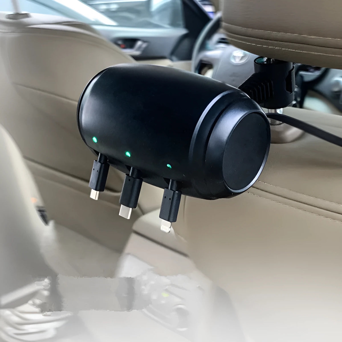 Black car headrest charger with 3-in-1 Micro USB, USB-C and Lightning ports and 1.5m auto-shrinking cable.