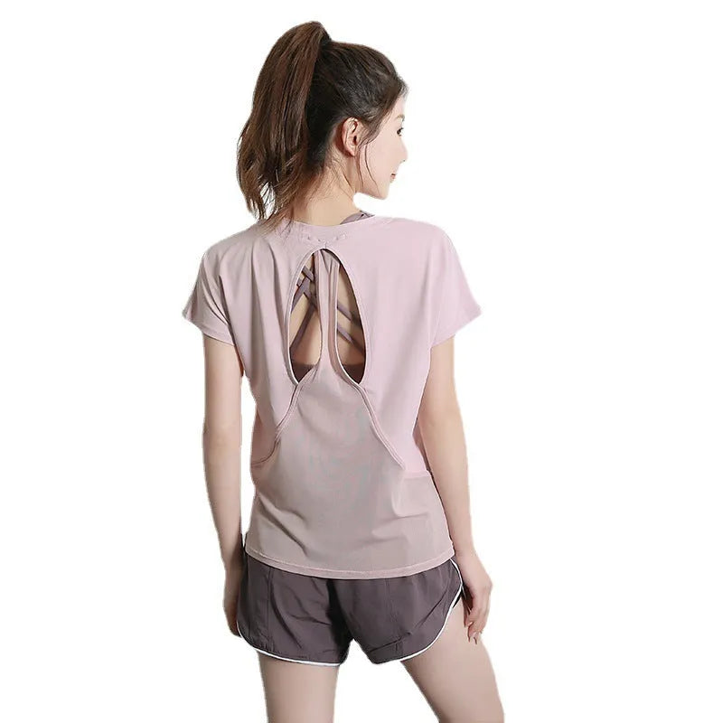 Women's short sleeve athletic t-shirt in sky blue, suitable for yoga and fitness.