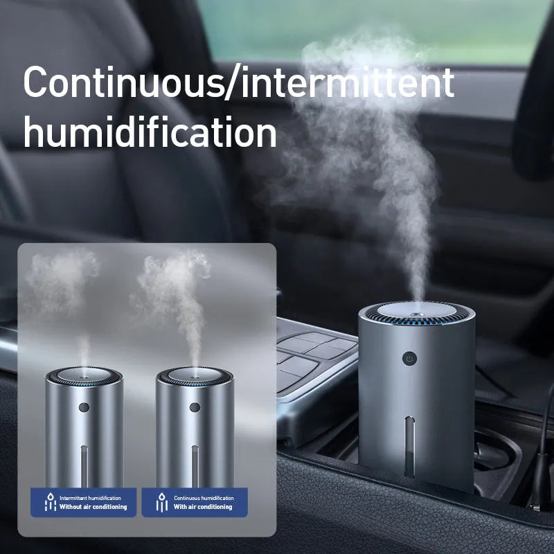 Black aluminium alloy car diffuser humidifier with USB cable on a car dashboard