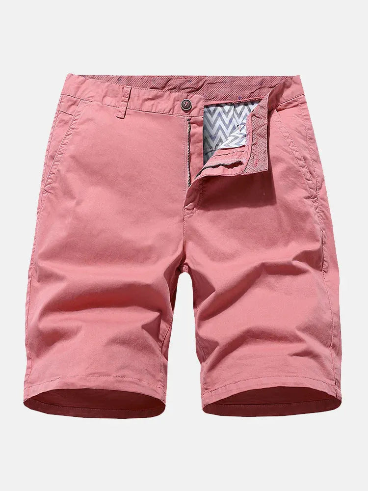 Man wearing blue printed denim casual shorts with an elastic waist and loose straight-leg fit