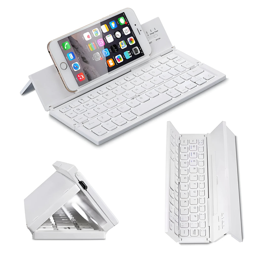 Black folding Bluetooth keyboard unfolded next to tablet showing ultra-thin design