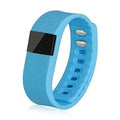 Bracelet pedometer watch in various colours showing digital display tracking steps, distance, calories, and time