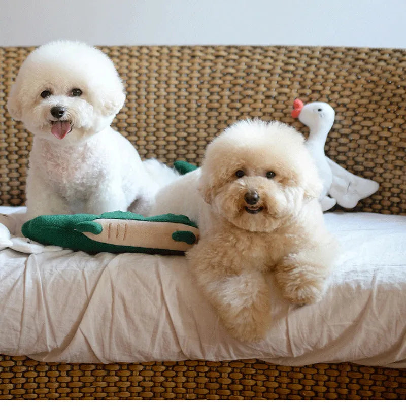 Green plush toy dog with interactive features, shown with scale indicating 35 cm length.
