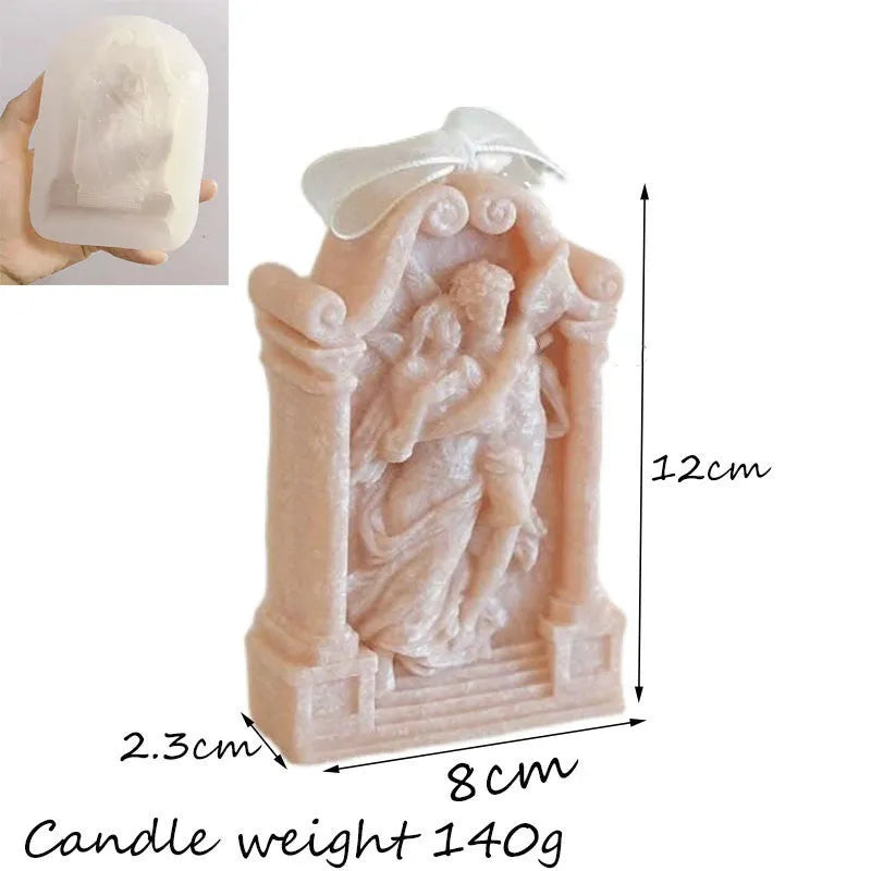 Flexible food grade silicone mold showing detailed Ancient Greek-style couple angel design for baking and crafts.