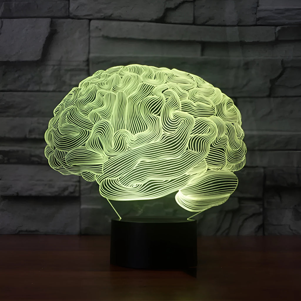 3D acrylic illusion desk lamp with colour-changing LEDs and a black ABS base on a wooden surface.