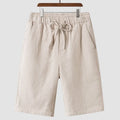 Men's loose-fit linen shorts in cropped length with elastic waistband