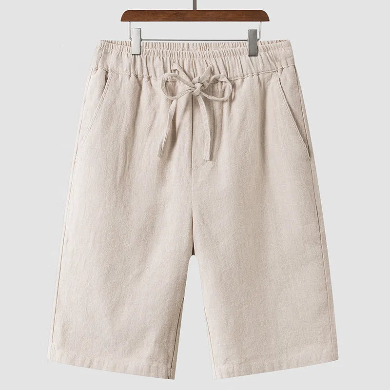Men's loose-fit linen shorts in cropped length with elastic waistband