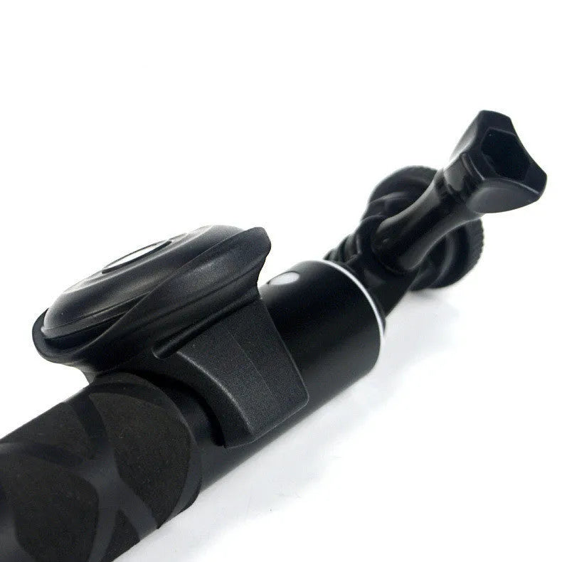 Black Bluetooth remote selfie shutter for smartphone photography with wireless operation