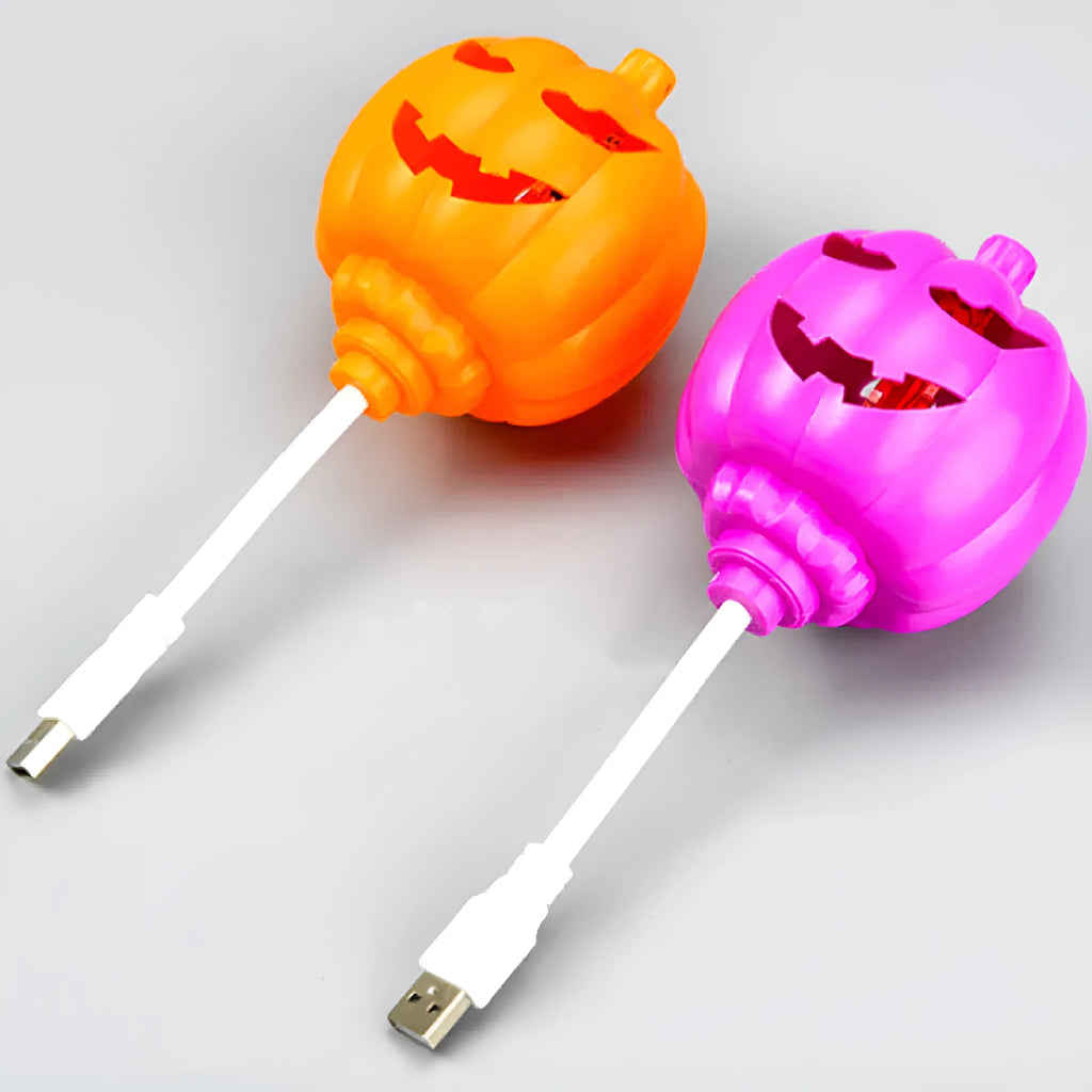 Plastic pumpkin lamp with yellow or purple light option, USB charging, 8.3cm wide by 22cm tall