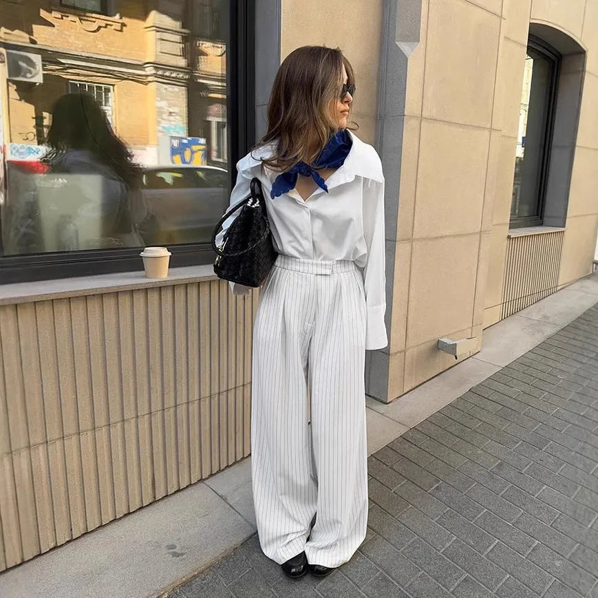White striped wide-leg trousers with zipper details on polyester fabric for office commuting