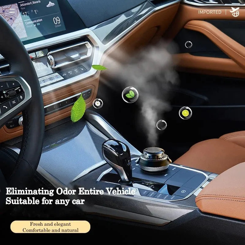 Solar powered kinetic car air freshener with double rotating rings on car dashboard
