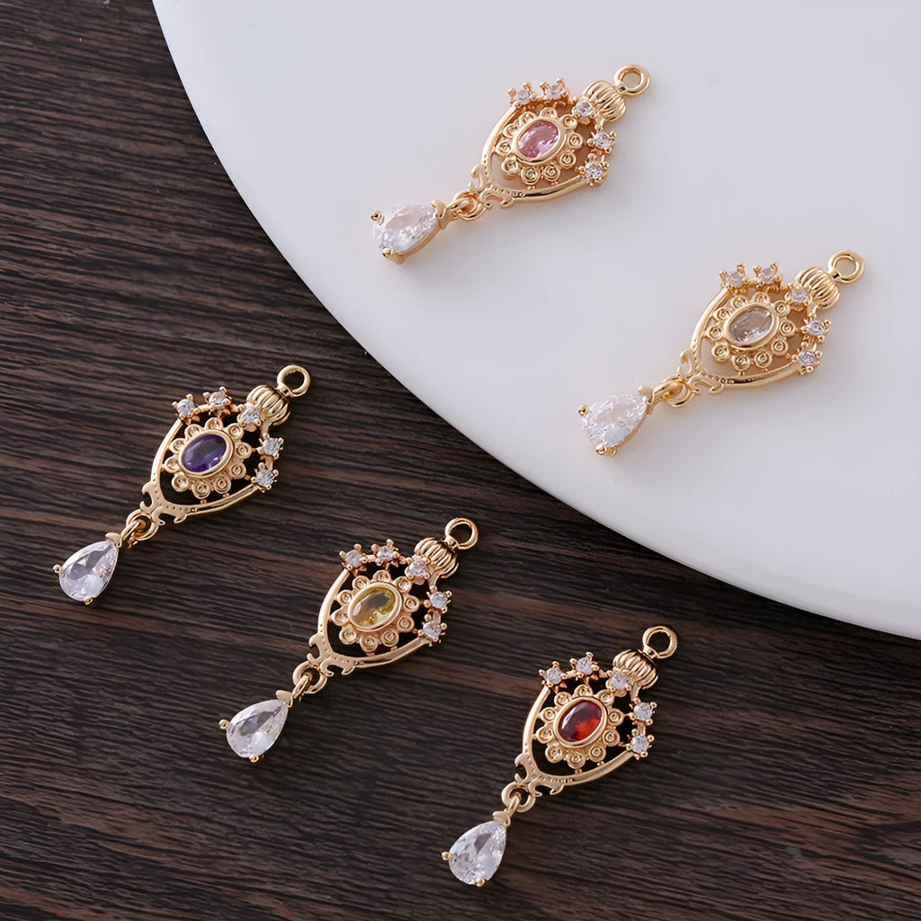 Copper water drop pendant with hollow crown design and zircon stones in five colours.