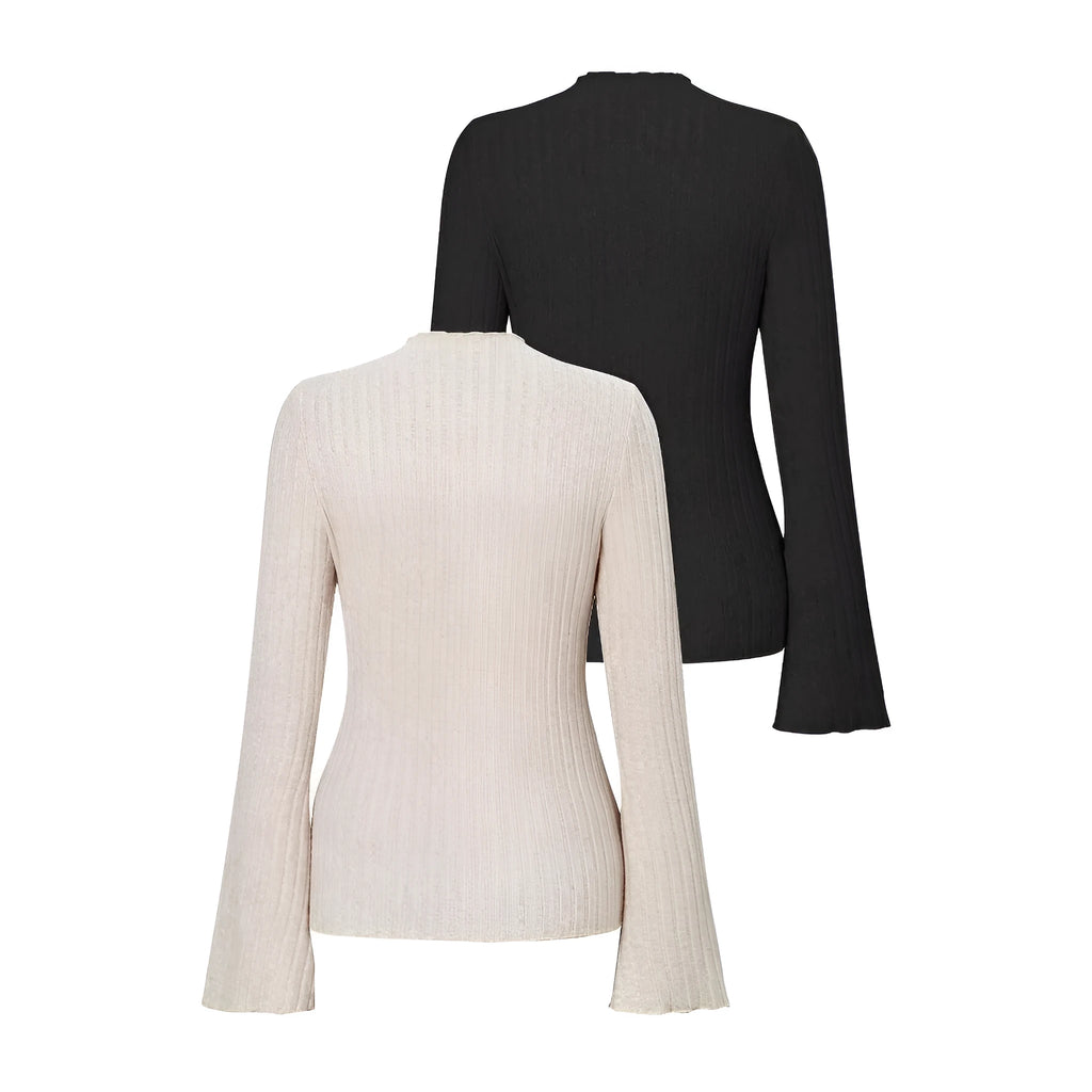 Long sleeve slim fit polyester top with lantern sleeves in black colour, showing round neck design