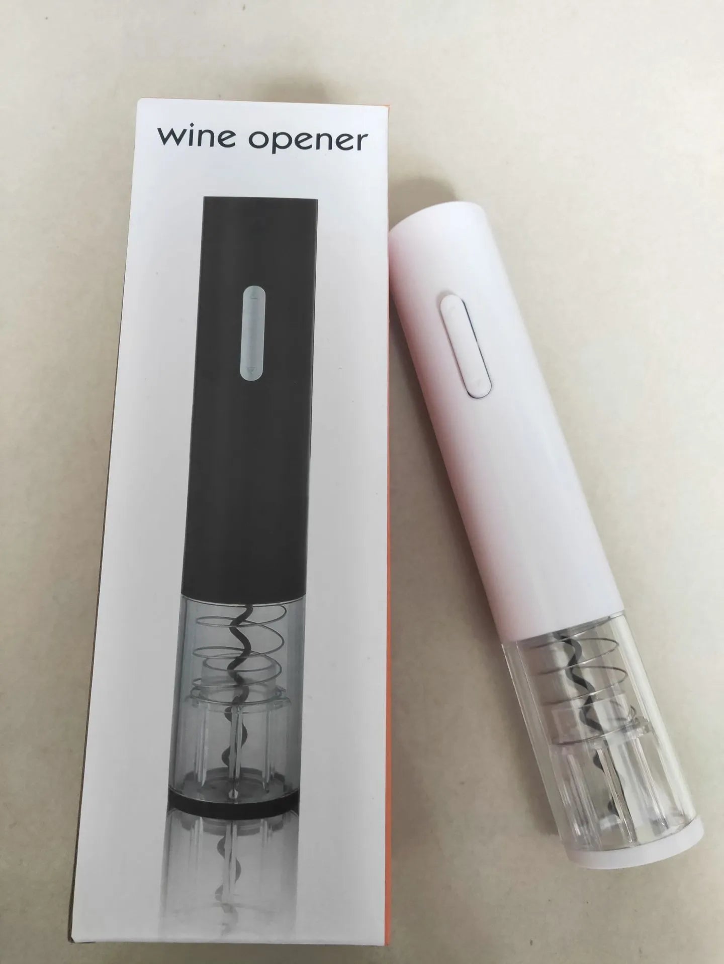 Automatic electric wine bottle opener with foil cutter in black, red, or white colours.