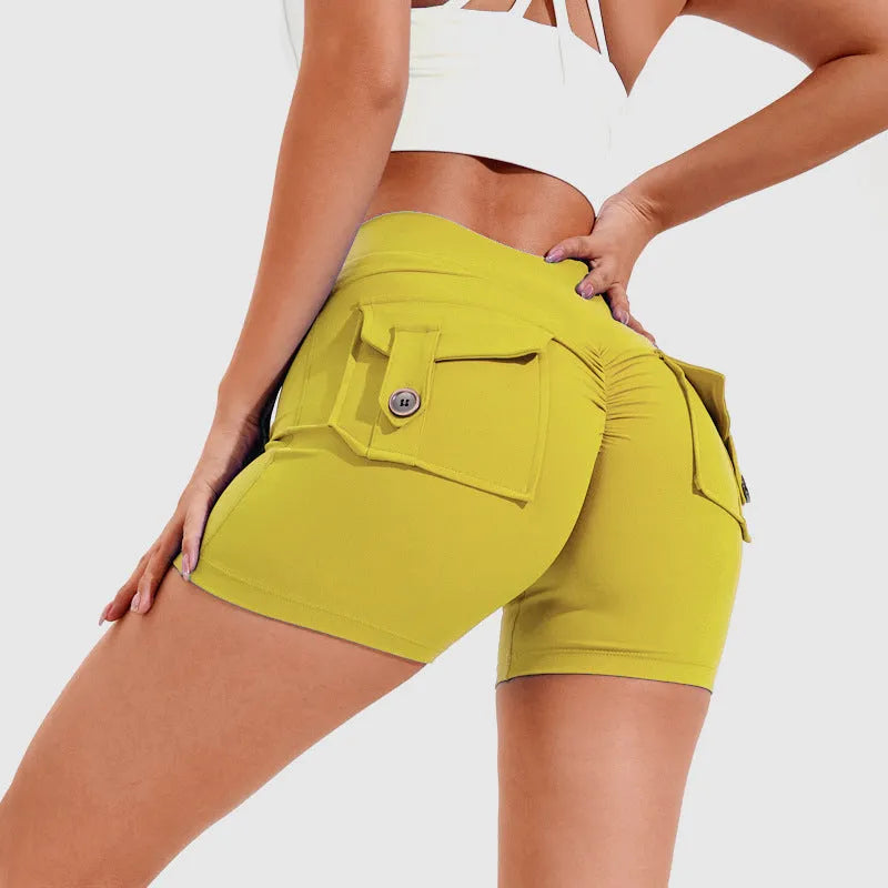 Women's high-waist fitness shorts in quick-dry nylon with side pockets, shown in Electric Blue.