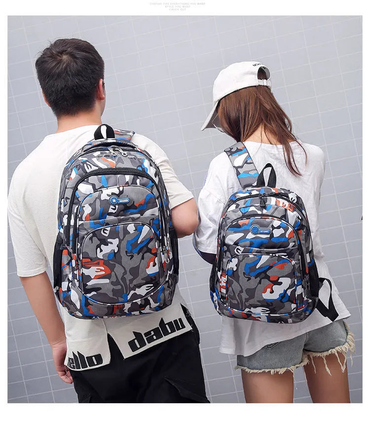 Blue Oxford fabric backpack with side zipper pockets and thick shoulder straps