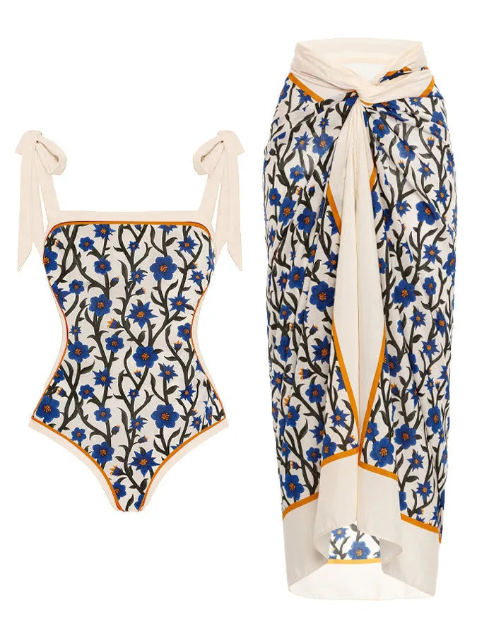 Women's printed floral two-piece swimsuit with a light chiffon hip skirt.
