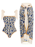 Women's printed floral two-piece swimsuit with a light chiffon hip skirt.