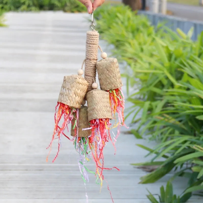 Wood and sisal rope shredded paper bird toy for parrots measuring 15cm by 35cm