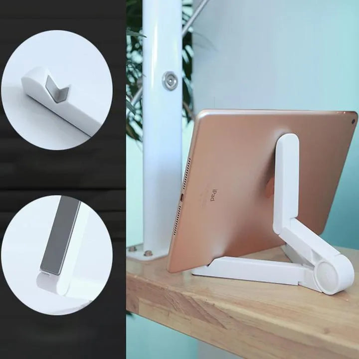 Black foldable tablet holder displaying smartphone at adjustable angle on desk
