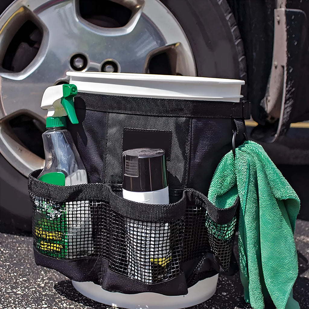 Black polyester cylindrical hanging storage bag designed for 5 gallon barrels