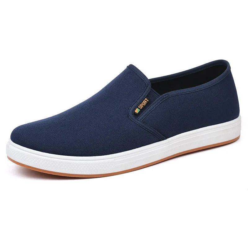 Men's low-top canvas slip-on shoes with round toe and injection moulded sole