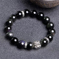 Natural obsidian stone bracelet with cloud pattern, showing 10mm and 12mm bead size options.