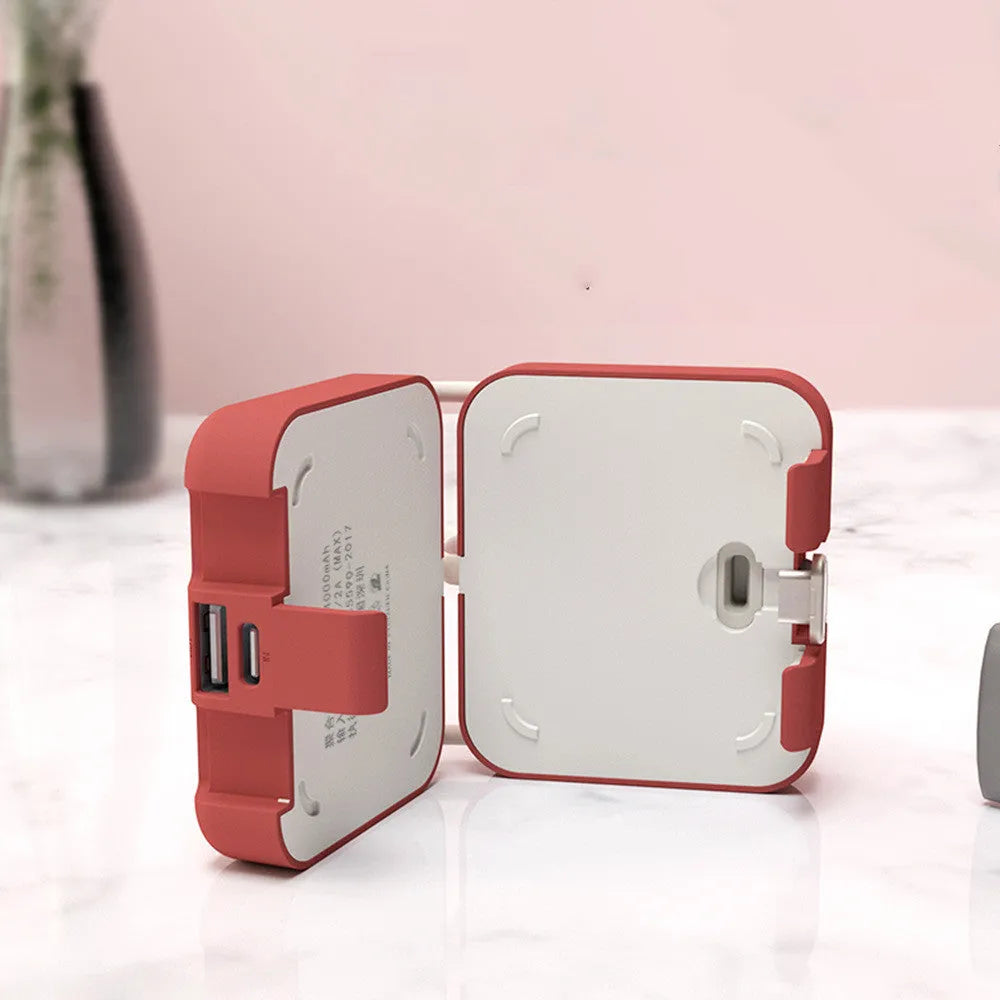 Handbag back clip power bank in blue, showing clip, phone stand function, and Type-C charging ports.