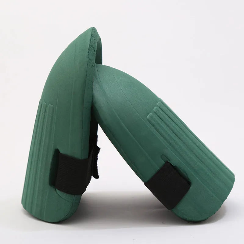 A pair of black and army green EVA foam knee pads for gardening protection.