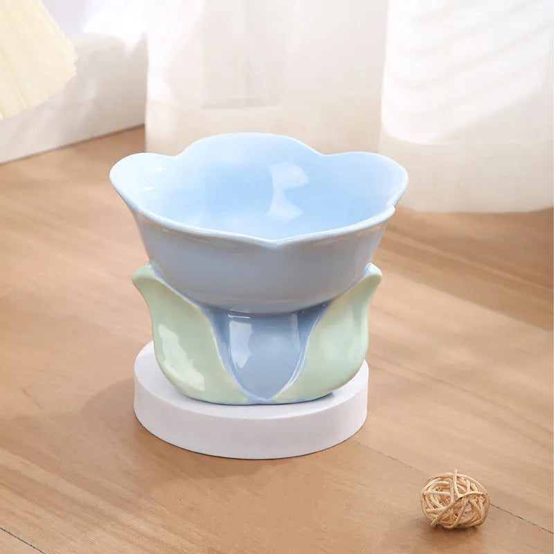 Blue ceramic raised pet bowl with floral pattern and non-slip base for cats and small dogs
