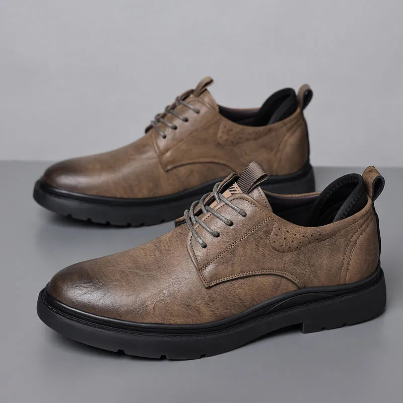 Men's black leather sneakers with rubber sole and sewing line detailing on two-layer cowhide upper