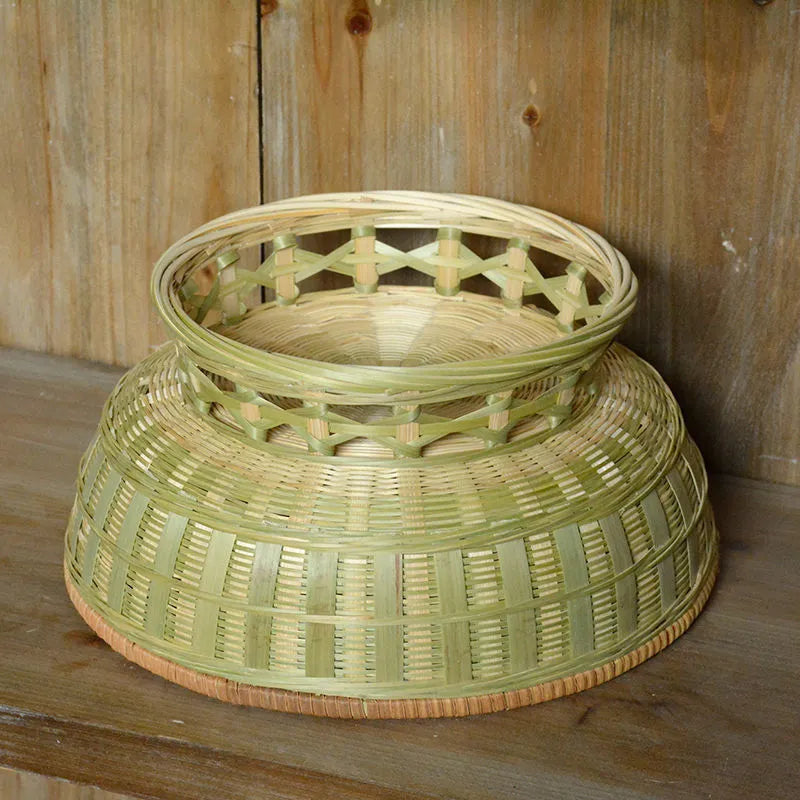Handmade natural bamboo storage basket in three different sizes for household organisation