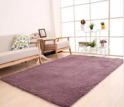 White fluffy plush area rug with rectangular shape and non-slip dot bottom