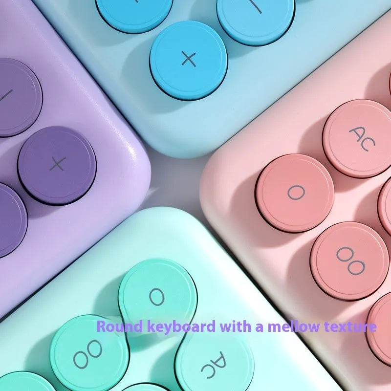 Gradient colour desk calculator in violet, pink, blue, or mint green on a desk