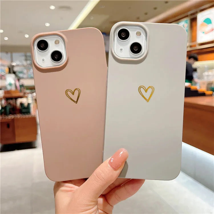 Soft grey silicone iPhone case with a hot stamped Love design, shown fitted on a phone.