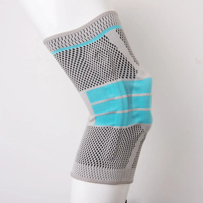 Sky blue elastic fibre silicone knee pad for sports protection, shown in S, M, L, XL sizes.