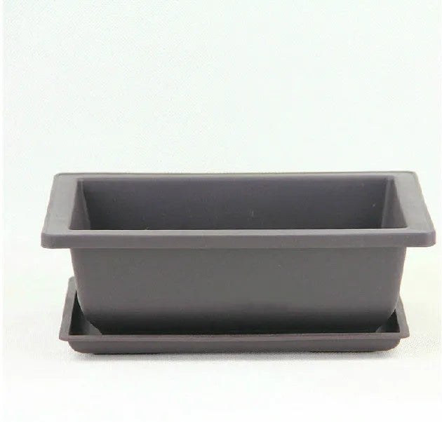 Dark brown antique-style plastic flowerpot in recycled material, showing classic design for indoor or balcony plants